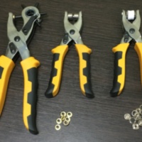 Діроколи та інструмент для люверсів